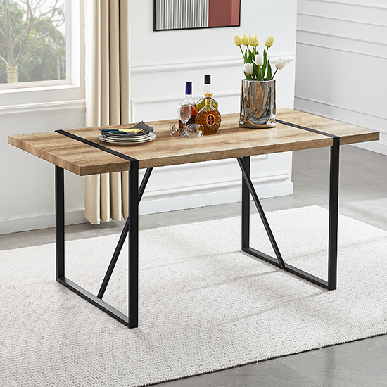 Read more about Vione rectangular wooden dining table with black metal legs