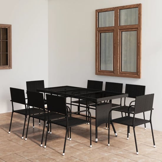 Product photograph of Waco Large Glass And Rattan 9 Piece Garden Dining Set In Black from Furniture in Fashion