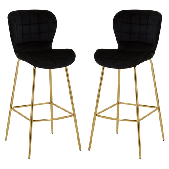 Photo of Warden black velvet bar chairs with gold legs in a pair