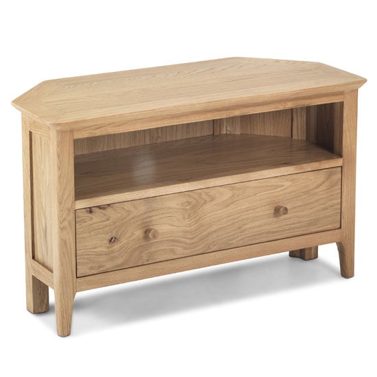 Photo of Wardle wooden corner tv unit in crafted solid oak with 1 drawer