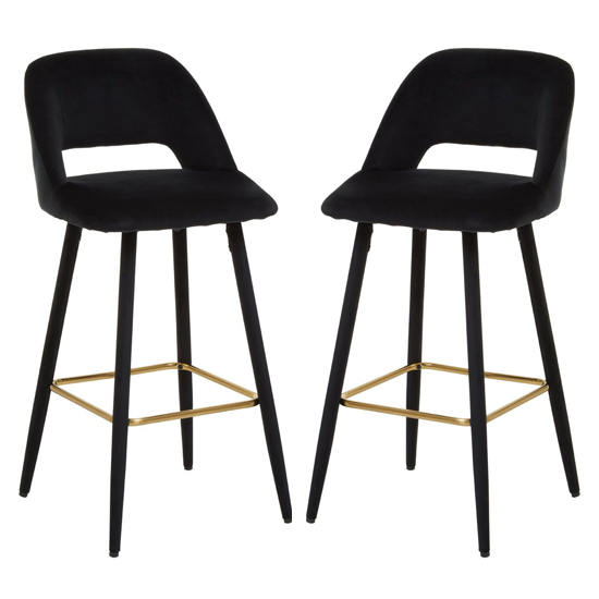 Photo of Warns black velvet bar chairs with gold footrest in a pair