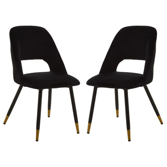 Read more about Warns black velvet dining chairs with gold foottips in a pair