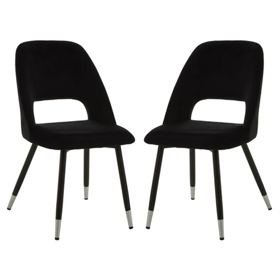 Read more about Warns black velvet dining chairs with silver foottips in a pair