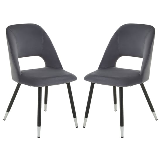 Photo of Warns grey velvet dining chairs with silver foottips in a pair