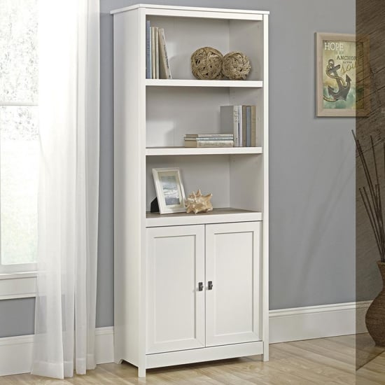 Photo of Wellton wooden bookcase with doors in white and lintel oak