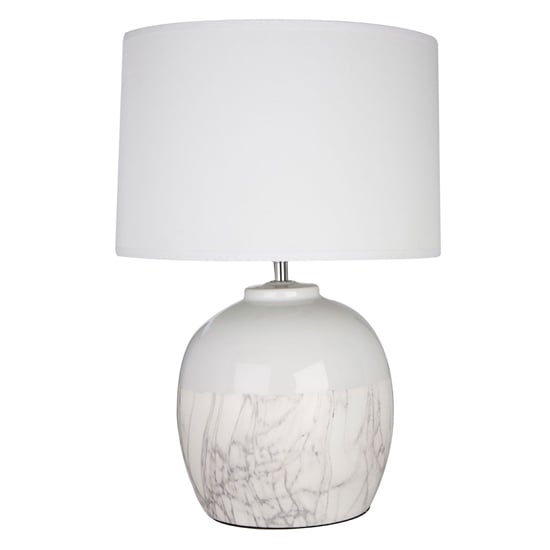 Photo of Whirly white fabric shade table lamp with ceramic base