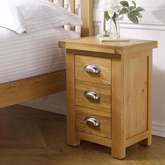 Photo of Woburn wooden small bedside cabinet in oak with 3 drawers