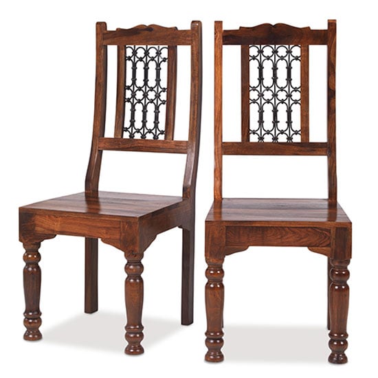 Photo of Zander wooden low back dining chairs in a pair with round legs
