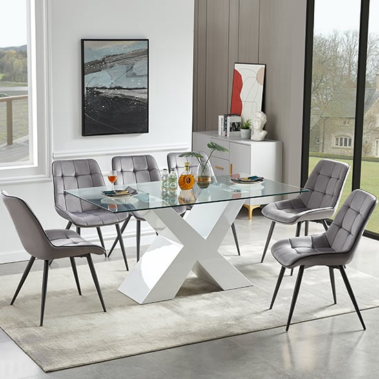 Photo of Zanti glass dining table in white base with 6 pekato grey chairs