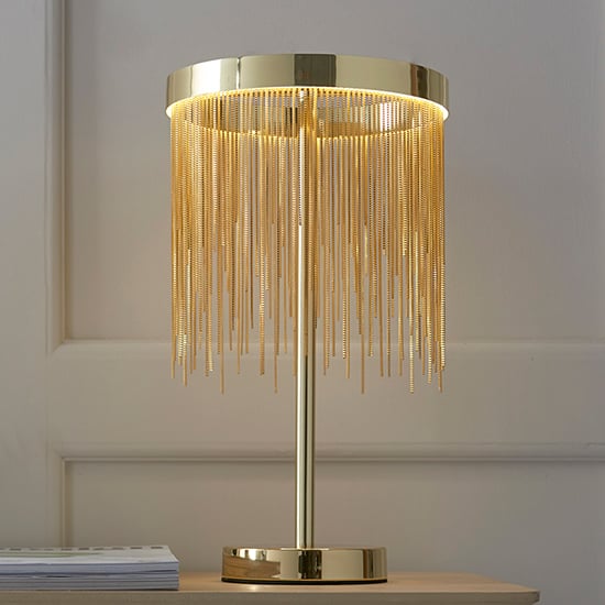 Photo of Zelma led table lamp in satin brass and gold