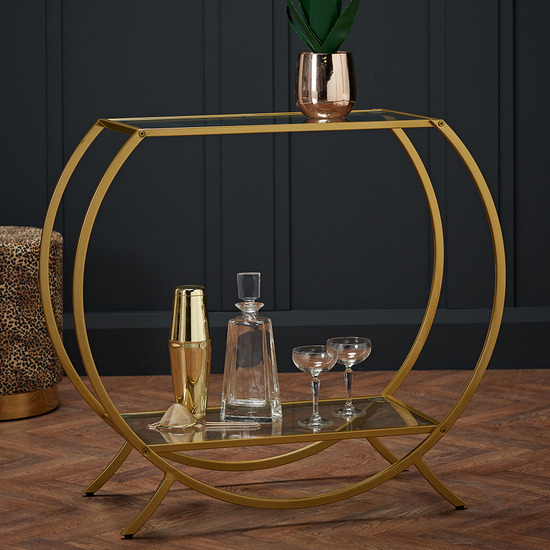 Photo of Zennor clear glass shelves console table with gold frame