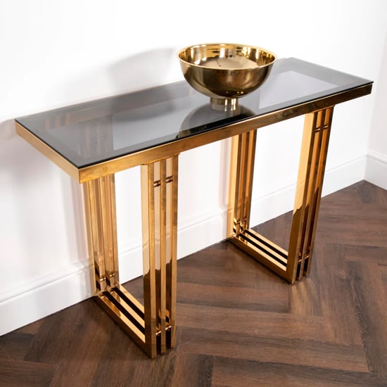 Product photograph of Zurich Smoked Glass Console Table With Gold Metal Frame from Furniture in Fashion