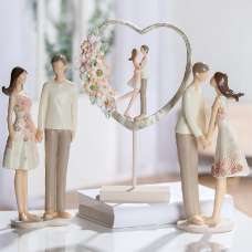Carnation Synthetic Resin Couple Heart Sculpture In Multicolour - UK