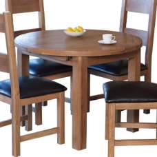 Hewitt Wooden Round Extending Dining Table In Oak - UK