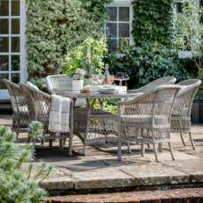 Maxton Outdoor Glass Top 6 Seater Oval Dining Set In Stone - UK