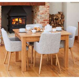 Fornatic Dining Table In Mobel Oak With 4 Light Grey Chairs