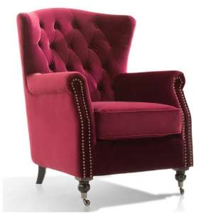 Reedy Velvet Wingback Chair In Berry With Metal Castor